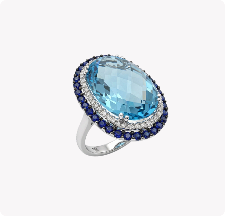 Blue Topaz Oval Ring with Sapphire and Diamond Halo in 18K White Gold